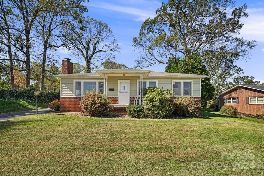 Beautifully maintained 3 bed ranch in the Flat Rock area of Henderson County. This home has been loved throughout the decades and boasts hardwood floors redone to their original beauty. Relax on the porches either in the privacy on the screened in back deck or in the spring time catch an inning of a baseball game from the front porch from East High baseball field while the beautiful rhododendrons bloom in the front yard. The detached 2 car garage is perfect for storage and for someone who loves cars. The garage has electric also. The home is located close to I-26 but far enough away to have no interstate noise but perfect for a commuter! Enjoy close proximity to Hendersonville and all Henderson County has to offer along with historic Flat Rock. This home had no flood damage as well from the recent hurricane.