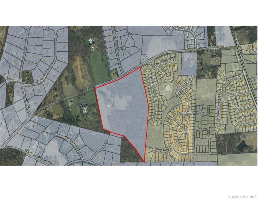 A rare find in Village of Marvin! Gently rolling terrain with fields, woods! Water & Sewer at property! Small cottage & outbuilding in great shape but given no value.  Two septics and two wells on property.  County sewer runs through property and water available.