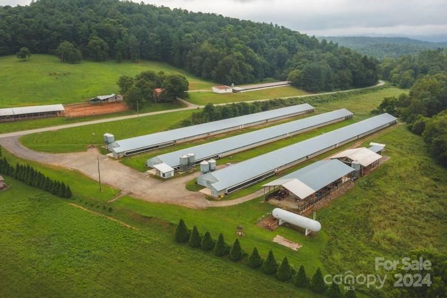 5 house poultry farm on 28 +/- acres to include event barn and sheds.