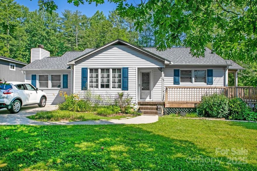 Have you been looking for a one level home on a picturesque street in the "Heart of Brevard"? This home has everything that you need on the main level with plenty of room to expand. It boasts 3 bedrooms and 2 baths, hardwood floors, a split bedroom plan, livingroom, den, and much more. It had a new roof, siding, and gutters, installed in 2023. The primary suite bathroom has an accessible bathtub, with permanently installed grab bars and a built-in shelf for ease of access. The full unfinished basement gives you plenty of potential for a workshop/studio, or whatever you desire. Outside you will enjoy the level front yard and the huge, fenced back yard. There is plenty of deck space for entertaining. It also has an enclosed covered porch that you could screen in. Just behind the house is the Ecusta Trail bike path. and it is just down the street from Ingles and the Brevard Middle School. Make this charming house your own and enjoy all of the conveniences of living downtown!