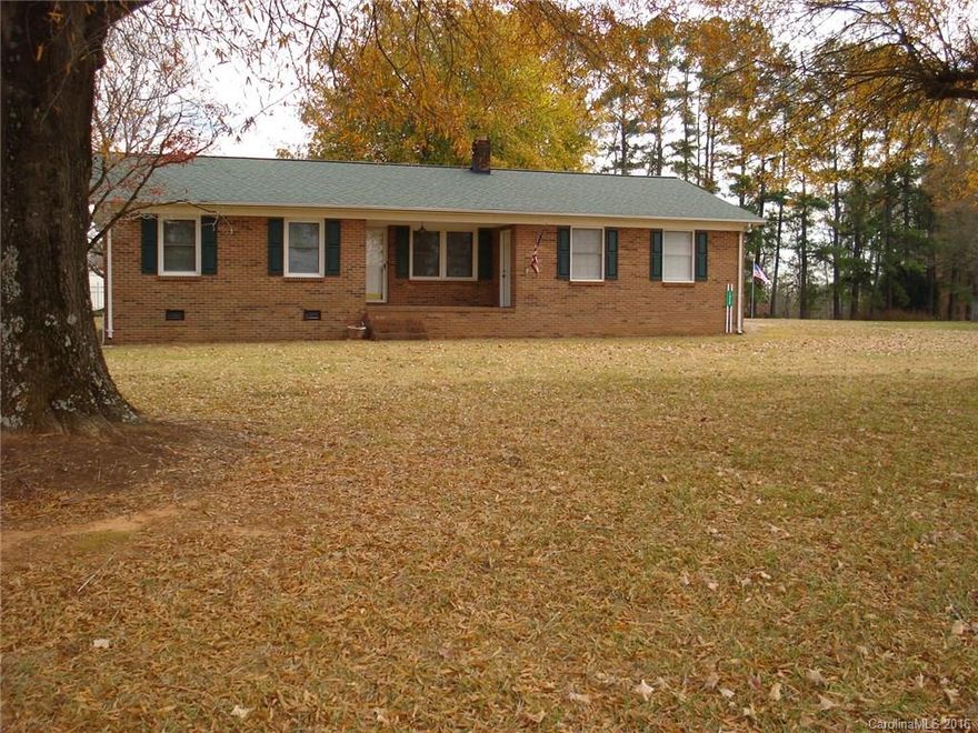 One owner brick ranch between Dallas & Cherryville NC with double garage. This house shows great, no city taxes.  Driveway is shared used only as access to a private family cemetery behind the property.