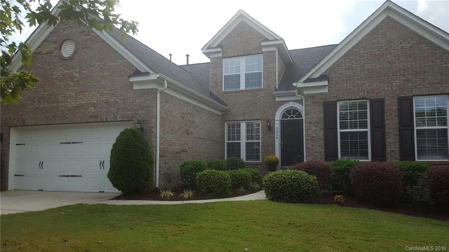 Absolutely stunning well maintained 3 sides brick ranch on cul-de-sac.  Open floor plan w/10' ceilings and beautiful hardwoods throughout 1st floor. Kitchen has 42" cabinets, SS appliances, granite counters.  Spacious GR with transom windows and gas fireplace.  Master Suite tray ceilings, garden tub, separate tiled shower & floors, walk-in closet. Versatile upstairs Guest/Teen Suite w/full bath.  Sunroom overlooks 20x10 deck & wooded fenced yard.  Professionally finished garage floors, cabinets.