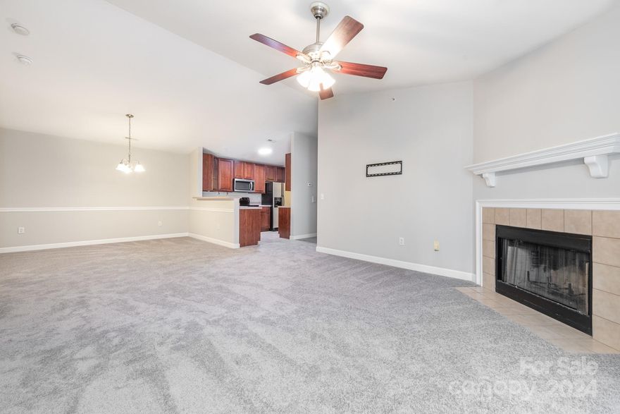 Discover this exceptional 2 bed, 2 bath condo, FRESHLY PAINTED AND NEW CARPET, and ready for immediate move-in. The top-floor location features HIGH VAULTED CEILINGS in the common areas, creating an expansive and inviting living space. Enjoy a PRIVATE COVERED BALCONY with a storage unit, perfect for relaxing and extra storage. The master bedroom is impressively spacious, offering a LARGE WALK IN CLOSET and an en suite bathroom. The SPLIT FLOOR PLAN is ideal for roommates, and the generously sized laundry room provides ample space. Situated in a sought-after complex near UNCC, this condo includes a PRIVATE ONE CAR GARAGE and an assigned parking space. The community offers fantastic amenities, including a FITNESS ROOM, POOL, and CLUBHOUSE. Conveniently located near shopping and dining, this condo combines comfort, style, and convenience, making it the perfect place to call home. Don’t miss out on this incredible opportunity!