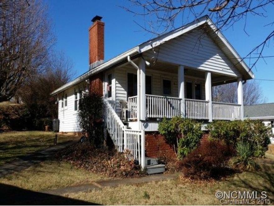 Convenient North Asheville location with Long Range Views! Hardwood/softwood flooring under carpet. Enjoy the views from the spacious covered front porch. Replacement windows on main level. Updated plumbing and electrical systems. Central air conditioning. Newer above ground fuel oil tank. Nicely landscaped, .45 acre yard consists of multiple lots. House needs TLC. In Woodfin Park subdivision as noted on plat.