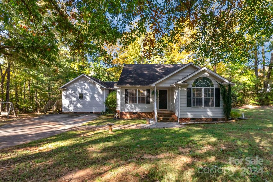 Welcome home! This charming ranch is located in Clover, SC with no HOA, on a private, corner lot on over 1 acre. This house has three bedrooms, two bathrooms with a detached studio apartment which includes its own kitchen, bedroom and bathroom with a separate entry. There is also a detached 11'x24' workshop that has power. Only a 10-minute drive to Papa Doc's Shore Club & put your boat in Lake Wylie for the day. You don't want to miss out on this great home in the country!