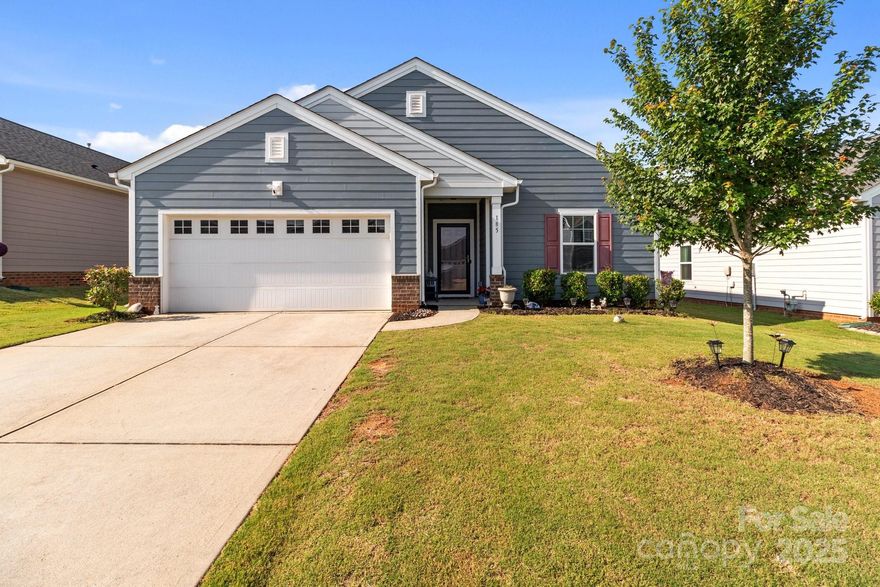 Welcome home to this beautifully maintained 3-bedroom, 2-bath ranch gem, perfectly located in the sought-after Mooresville Graded School District and just minutes from vibrant downtown Mooresville.  Enjoy the ease of an open floor plan, ideal for everyday living and entertaining.  The spacious kitchen is a true centerpiece, featuring a large island, granite countertops, pantry, and stainless steel appliances-all included!  Cozy up by the gas log fireplace in the living room or step outside to your fully fenced backyard, perfect for pets, play, or relaxing evenings.  Heritage at Neel Ranch also offers an in-ground pool for summer enjoyment.  The primary suite offers a private retreat with an en-suite bath and generous WIC, while the two additional bedrooms share another full bathroom-ideal for family or guests.  This home also has a large 2 car garage and designated laundry room for further comfort.  This beauty is move-in ready and waiting-ask about $3k in paid closing costs!