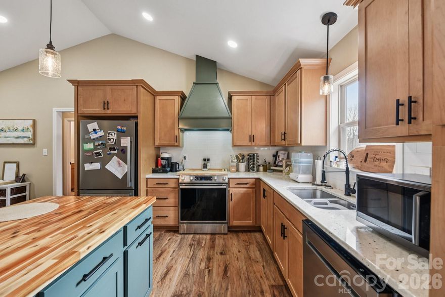 Motivated sellers are ready to get moved closer to their new jobs! Price reduced. Welcome home to this beautifully crafted 2024-built ranch offering effortless one-level living, modern finishes, and the peaceful charm of country surroundings — all just minutes from I-85.

A welcoming covered front porch sets the tone, inviting you inside to a bright and spacious open-concept great room with soaring ceilings and warm, durable laminate flooring throughout. The heart of the home is the stunning kitchen, featuring granite countertops, stainless appliances, abundant cabinetry, and an oversized butcher block island designed for gathering, entertaining, and everyday living.

This thoughtfully designed layout offers 3 bedrooms and 2 full bathrooms, including a private primary suite that truly feels like a retreat. Enjoy a relaxing garden tub, separate shower, expansive walk-in closet, and the comfort of a space designed for both privacy and relaxation.

Two additional bedrooms are generously sized and share a second full bath conveniently positioned for both guests and daily use. A dedicated laundry room adds everyday practicality.

Step outside and discover what truly sets this property apart — a spacious .64-acre lot with a custom backyard fire pit area, perfect for evening conversations under the stars. Whether you're hosting friends on the deck, grilling out, or enjoying quiet mornings with coffee, this outdoor space offers both versatility and privacy.

While you have plenty of room to spread out, it is also conveniently located near W.G. (Bill) Hefner VA Medical Center, Novant Health, and plenty of restaurants and shopping.

Additional highlights include:
• Attached two-car carport
• Central HVAC with heat pump
• Energy-efficient 2024 construction
• Move-in ready condition
• One-owner home, lovingly maintained

Ideally located with convenient access to I-85, convenient boat access at the Yadkin River Park which feeds into High Rock Lake, and the nearby towns of Spencer, Salisbury, and Lexington, this home offers the perfect blend of accessibility and retreat-style living.

Modern comfort. Outdoor lifestyle. Low-maintenance peace of mind.

This one checks the boxes — schedule your private showing today. 

(Note: Listing agent is related to seller.)