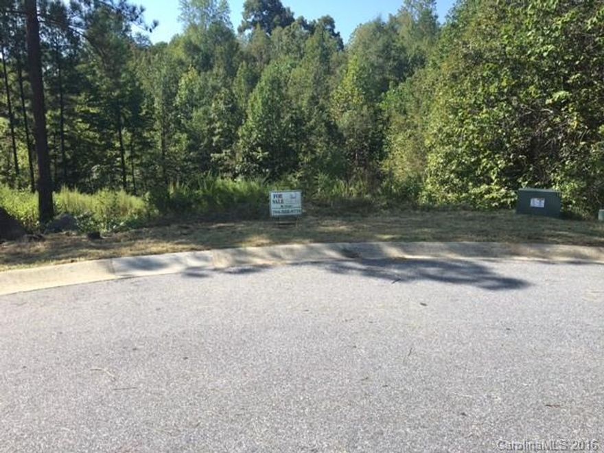 BOM due to out of state builder who purchased multiple lots in VR and cancelled all. No issue with the lot. Located just off the 7th green, this cul-de-sac lot offers all the privacy you could ask for. Large lot wooded in back, with stream at the rear of the property. If you are looking to build your dream home with a walk out basement foundation, his is the lot for you. Amenities include an 18 hole,Championship Golf Course, Dining,Clubhouse, Pool, Tennis. WATER & SEWER TAP FEES PAID FOR.