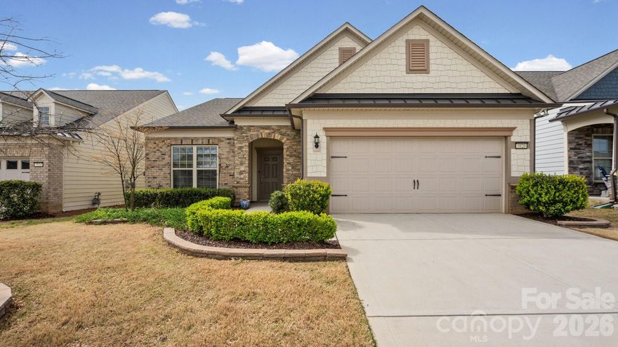 Welcome home . . . Martin Ray model is the favorite of the Expedition Series. Open concept living, great for indoor/outdoor entertaining. Front Office with glass doors is ideal for work or quiet reading.  Upgraded Kitchen, staggered white cabinets, quartz countertops, KitchenAid ss appliances, gas cooktop, refrigerator inc, large island w/seating, pendant lights. Butler's Pantry with cabinets and a large walk-in pantry are between the Office and Kitchen.  Great Rm with corner fireplace and Dining area offer room for family and friends to gather.  A primary Bedroom w/tray ceiling and walk-in closet looks out onto your private back yard.  Feel like you are at the spa with the zero-entry walk-in shower in the primary Bath.  There are two additional Bedroom, another full Bath, and a Laundry Room with cabinets - washer/dryer included.  A Sunroom with glass doors leads to your screened porch, patio and back yard with beautiful landscape, hardscape, lawn maintenance and in-ground irrigation.  Tons of amenities--indoor/outdoor pools & hot tubs, 8 lit pickleball courts, 4 lit tennis courts, 2 bocce courts, dog park, playground, fitness center, full time activities director. Come join us in theOrchards. It' a great place to call home.