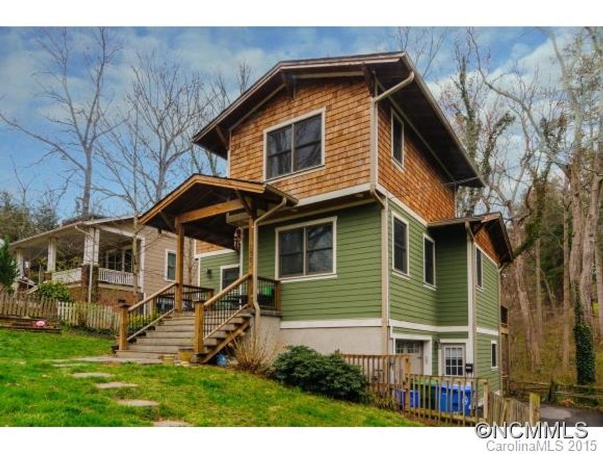 Get the location you want without the headache of older construction in this charming arts and crafts home. Enjoy easy access to everything on a private street situated between UNCA and Merimon.4 bedrooms 3 bath,Master on main with beautiful wood details throughout.Enjoy evenings on your private back deck grilling with friends, then slip inside to warm up by the fireplace. Basement living space has separate entrance and kitchenette for guests.