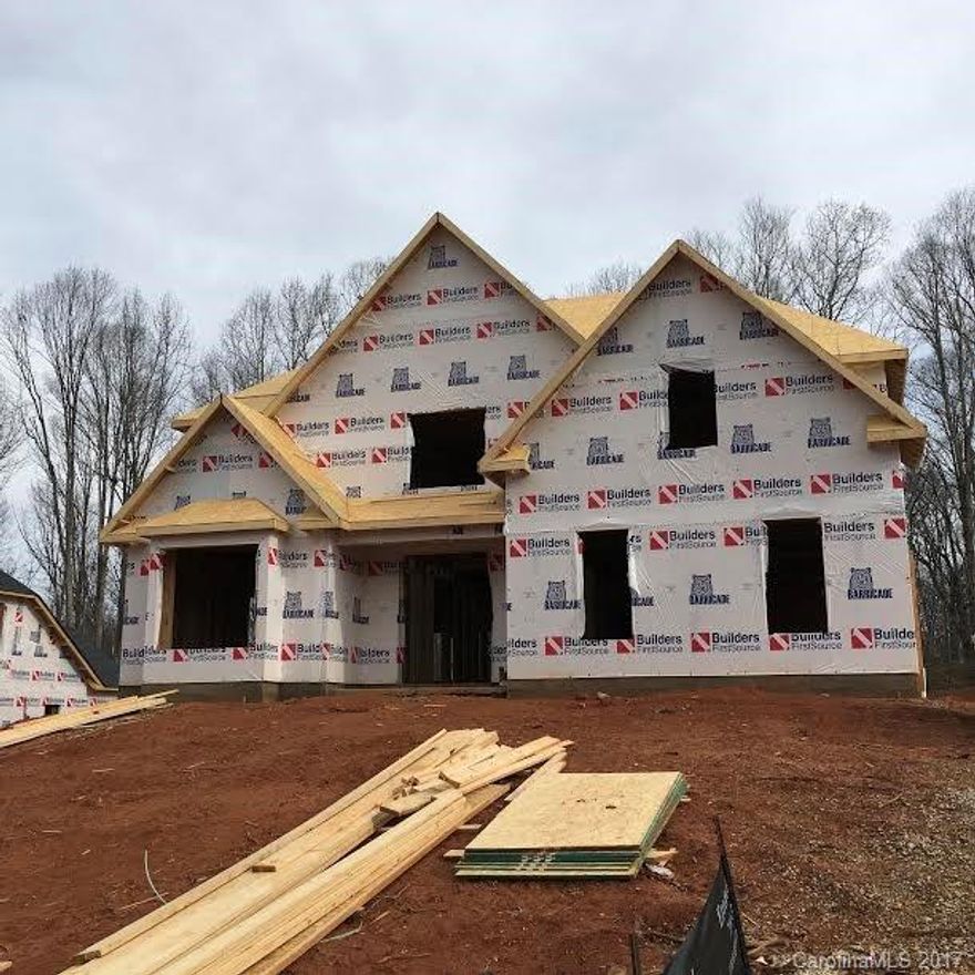 5 bdr, 4 bath open floor plan with Master bedroom suite down.  Gourmet kitchen with gas cook top, double oven, large island. Dining room has coffered ceilings and lots of moldings and columns.  Upstairs bedrooms have vaulted and trey ceilings and spacious closets.  Stair have iron spindles.  Back porch is covered great for cook outs. Must see!