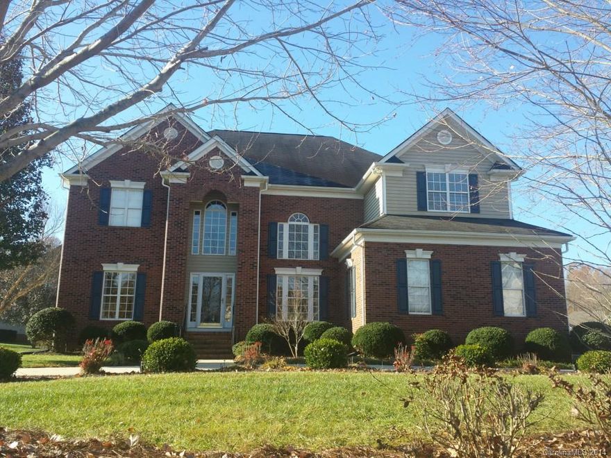 This home combines traditional elegance with casual living. From the formal entrance to the open great room, renovated kitchen & bright sun room the atmosphere is welcoming. The ideal floor plan includes a main floor bedroom & full bath. Master retreat, office, huge bonus room & 2 additional bedrooms complete this well designed castle! Could be 6 bedrooms! 9 foot ceilings on both floors. 3 car garage w/ 18 ft door, extended concrete for parking & circular drive.  Community pools & lake access.