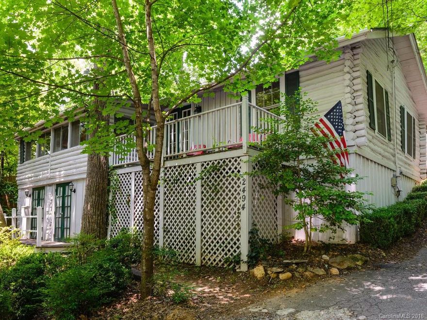 Cabin and cottage business ready for new owners. Each unit has a hot tub and private setting. Beautiful wooded lot.  Located near the foot of Chimney Rock Mountain and just around the corner from the Lake Lure beach and marina. Business is turn-key ready. 5 rental units or owner live in one and rent 4.  Great location, strong history. Books available for qualified buyer. Owner finance may be available.