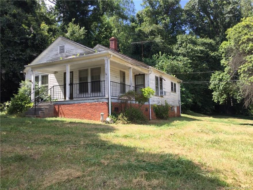 PRICED BELOW TAX VALUE! 3 Bedroom/1 bath home on 9.82 acres close to town.Beautiful piece of land,mature trees,creek back & side of property.Walking or dirt bike trails,Outside storage building, some land cleared.Built-in closet,hardwood floors most rooms,House needs work,roof does not currently leak.Seller does not know condition of Well & septic,no septic permit on file with county.City water at street needs
 connected to house.Home SOLD AS IS,seller will make NO REPAIRS.Value is in the Land.