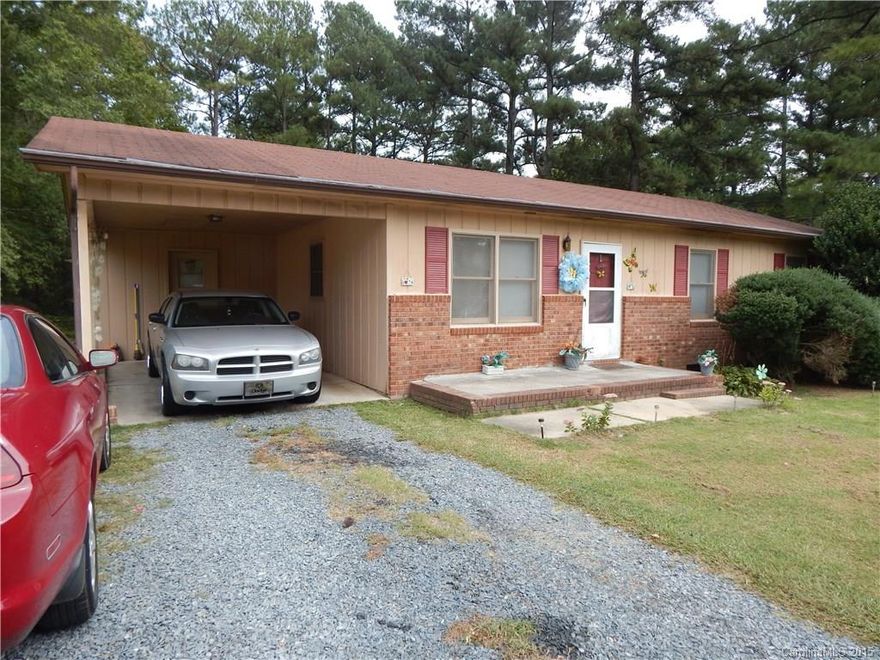 Nice 3 bedroom home in quiet neighborhood of Norwood, NC.  "Gateway to Lake Tillery"  This house is about a mile from the lake, inside the city limits.  Big yard with huge woods at the back of the lot!  Pretty kitchen/family room, lots of closets, big walk in mud room with laundry off carport.  Nice deck off back of the house.  Great house for a great price!