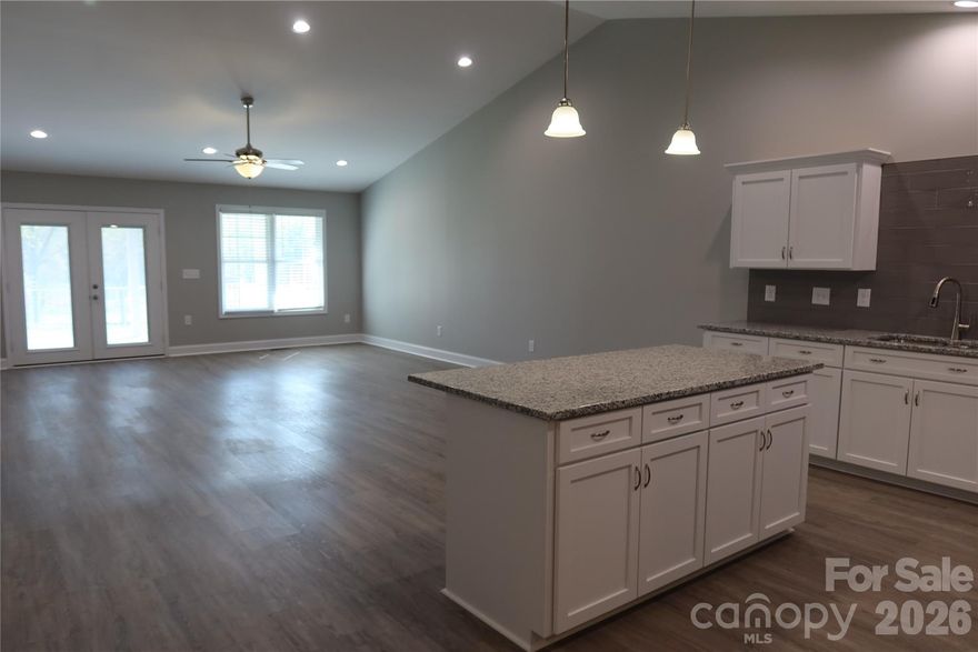 Welcome to this brand new, beautifully maintained townhome offering the perfect blend of comfort and convenience. Featuring 2 spacious bedrooms and 2 full bathrooms, this home is ideal for first-time homebuyers, downsizers, or anyone seeking low-maintenance living. The open-concept living, dinning and kitchen area is filled with natural light, creating a warm and inviting atmosphere with ample counter space and storage. Step outside to your covered back deck - perfect for morning coffee, relaxing evenings, or year-round entertaining. Additional features include the primary bedroom with a walk-in closet and private bath with a walk-in shower, dedicated laundry room, and outdoor storage area - all on one level. Located in a great area! Don't miss your chance - schedule a showing today!