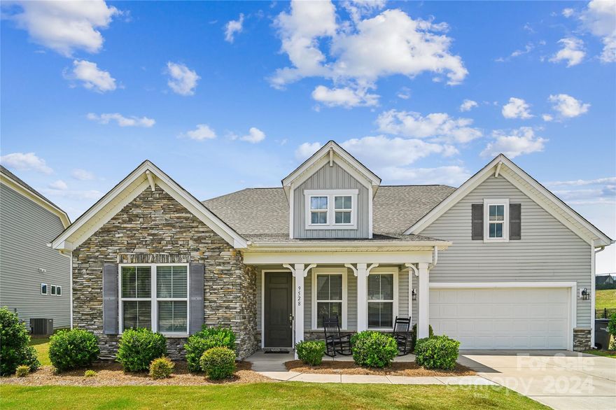 Welcome to your new home in coveted Wellington Chase!  This open concept ranch comes with a split floor plan, 5 inch pre-finished hardwoods throughout the living areas, and an upstairs loft and en-suite bedroom.  Gourmet chef's kitchen is fully equipped with granite countertops, stainless steel appliances, a gas cooktop, tons of cabinet space, and a large island - perfect for prep or entertaining.  Primary en-suite bedroom is appointed with tray ceilings, beautiful bathroom finishes, and tons of storage.  Solar panels were installed in 2022 and help tremendously with energy costs, average electricity bill is about $15-$30 a month!  Solar panels will be paid off at closing by the sellers.  Lawn maintenance included in HOA fees.  New carpet throughout upstairs & primary closet.  Imagine stepping out onto your new screened-in porch and enjoying a nice cup of coffee every morning overlooking the pond.  How relaxing!