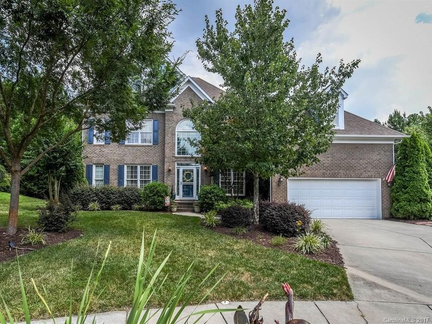 Wonderful 3 story cul de sac home in prestigous Tega Cay w/desirable schools. Pride of ownership is apparent throughout. Home features detailed moldings; updated fixtures; 2 story foyer; gleaming hardwoods on main;  Chef's kitchen w/granite; dual staircases; master on main; plenty of natural light; office w/French doors; large bedrooms; & abundant walk in storage. Relax on your vaulted screened in porch & enjoy your private, level & fenced backyard. Roof 2011; Water heater 2017;upper HVAC 2012.