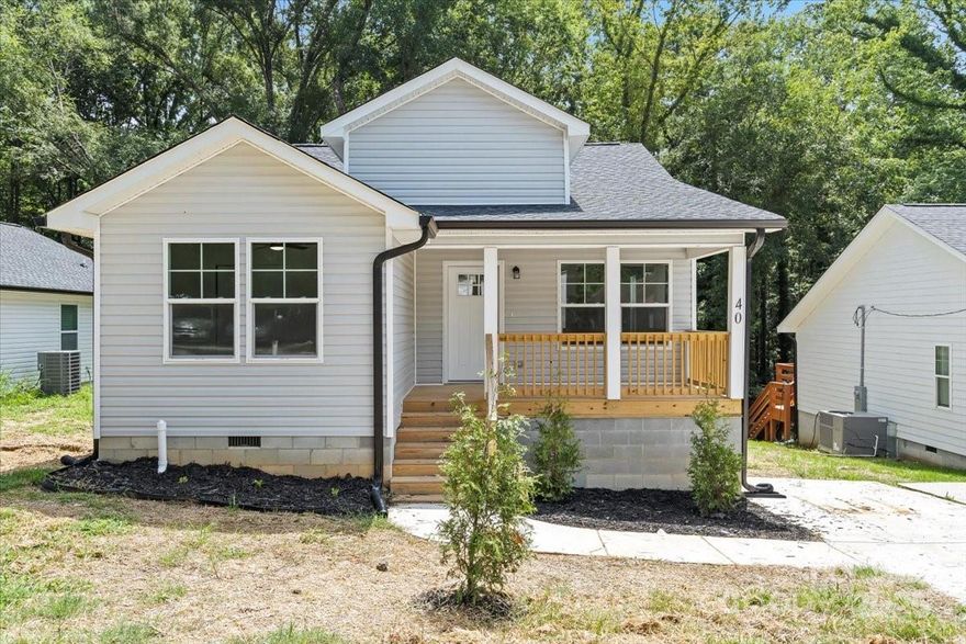 100% Financing Available! Brand-New Construction in Charming York, SC! Welcome home to this beautifully built 3-bed, 2-bath residence located at 40 Magnolia Street in the historic “White Rose City.” Step inside to an open and inviting floor plan designed for comfort and functionality. Enjoy a welcoming front porch for morning coffee and a spacious back deck perfect for entertaining or relaxing outdoors. Situated on a generous lot, this home offers the peaceful charm of small-town living with unbeatable convenience—just minutes to downtown York, approximately 13 miles to Rock Hill, and about 27 miles to Charlotte. York is known for its rich history, vibrant community events, and proximity to parks, shops, and dining. Seller is offering $5,000 in closing costs with an acceptable offer!