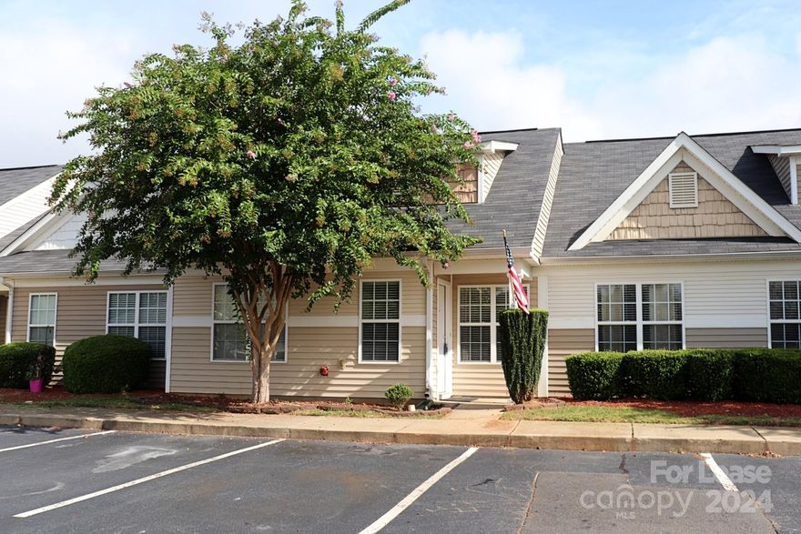 LOCATION! LOCATION! A great townhome in the heart of Lake Wylie, close to shopping and restaurants, and right across from the community pool. Everything is spic n' span, with lots of nice upgrades throughout. Enter into the living/dining area Featuring attractive wood laminate flooring and chair rail accents. Tile flooring in the foyer and kitchen, The Kitchen has nice cabinets/counter space + pantry, and tiled backsplash. There are 2 BRs & full bath on the main. Laundry room on the main with washer/dryer included. The master is tucked away upstairs and has a full bath and WIC.  You'll love the private, enclosed deck area - perfect for relaxing or setting up the BBQ, and a storage building with workbench. Clover Schools! Pets Conditional. Only one dog <25 pounds considered. **NO CATS.**