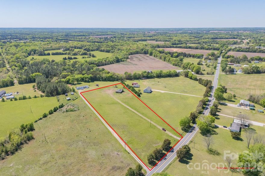 Cleared 4.82 acre lot in the county. Build your custom home on this level lot with space to roam. Easy access to Hwy 72 and downtown Rock Hill.