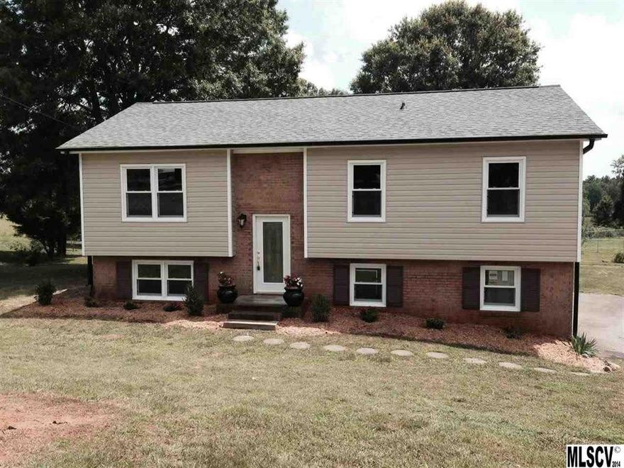 Beautifully remodeled 4 bedroom home NEW roof, windows, vinyl siding, kitchen cabinets, granite countertops, porcelain tile, hardwood floors, bedroom carpeting, and completely finished basement. Easy to show same day