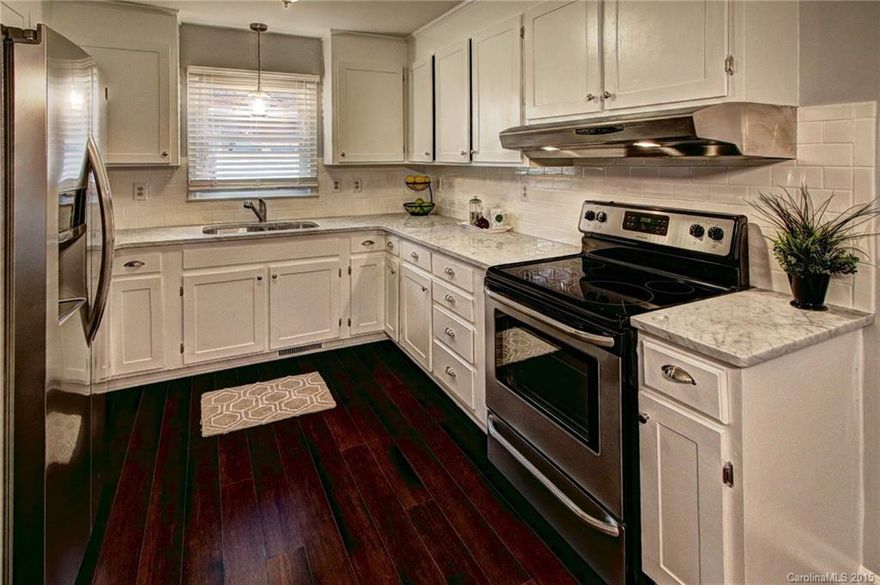 Completely renovated home.  This is a great location with easy access to uptown, and highways. This home is better than new.  *Brand new HVAC*!  Other improvements include, marble counter tops, tile back splash, stainless steel appliances, Hardwood’s, ceramic tile, and fresh paint in and out.  The home also features all new brushed nickel light fixtures, faucets, and 2.5” blinds.  A freshly manicured green space, and lawn complete this renovation.  This is a great deal, wont last long!