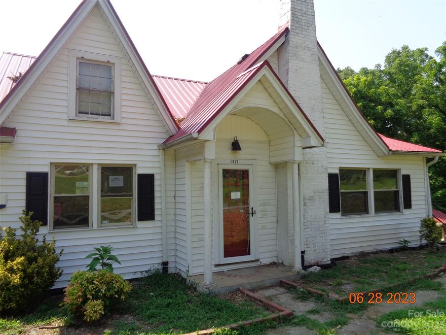 Fixer upper with inground pool, primary bedroom on main, primary bath & half bath on main. Fireplace in living room. Kitchen & dining on main. Patio on main overlooks pool. Some hardwood floors on main & upstairs. Upstairs has 2 bedrooms and bath. Unfinished unheated basement has bar area, storage room & half bath. Storage building beside pool & driveway. Condition of plumbing, electrical, hot water heater, heat, a/c, pool, pool pump unknown. Power off power line detached from home when tree fell in driveway. Tree has been removed. Sold "as is". Online auction.