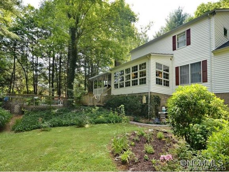 The lifestyle you deserve! 4BR/3.5 BA plus Amazing SunRoom & Library.  Private setting displays Beautiful gardens & Outdoor Spaces. Great RM is Open to Kitchen, features GAS FPL, Plenty of Built-Ins & Vaulted Ceiling.  Kitchen & Baths are Wonderfully Updated. Master on Main. Upstairs Features New HDWD FLS, 2nd MA BR, Spacious Guest BR, Flex Room & Additional Storage. New roof 2013, HVAC 2014. Sublime Rear Deck. Level Entry from Gargae.A must See!