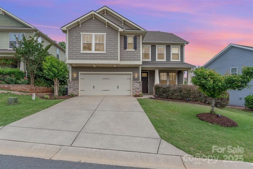 Welcome to Riverchase! This stunning 5-bedroom, 4-bathroom residence, freshly painted, sits on a cul-de-sac street. This thoughtfully designed, open floor plan includes a fireplace perfect for cozy evenings at home. The heart of the home is the kitchen featuring a large island, gas cooktop, and smart fridge perfect for entertaining and everyday living. The spacious primary suite is equipped with a large walk-in closet and double sink bathroom. Host gatherings on the oversized screened porch, overlooking a beautiful yard with a fire pit. The home boasts a tankless water heater for endless hot water and spray foam insulation for energy efficiency, keeping utility costs low. Located in a TOP-RATED SCHOOL DISTRICT, residents have access to a community pool, 18 hole disc golf course, scenic walking trails, and serenic Catawba River. Just minutes from new shopping centers in development that feature stores like Target, Costco, Harris Teeter, and Swig! This home offers unbeatable lifestyle!