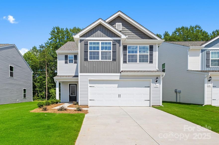 Welcome to your dream home at 1157 Nia Rd, Charlotte, NC 28215!
This beautiful 3-bedroom, 2.5-bathroom single-family home, built in 2023, offers a spacious 2,025 sqft of modern living designed for both comfort and functionality. Step inside to discover a bright, open-concept floor plan that seamlessly connects the living room, dining area, and gourmet kitchen—perfect for entertaining or everyday living.

The kitchen is a chef’s delight, featuring granite countertops, upgraded stainless steel appliances, 36” upper cabinets, brushed nickel hardware, and a large center island ideal for meal prep or casual gatherings. Upstairs, the primary suite provides a relaxing retreat with abundant natural light, a dual-sink vanity, and a walk-in closet with exceptional storage.

Located in a prime Charlotte location, this home offers convenient access to I-485, Albemarle Rd, grocery stores, dining, and Uptown Charlotte. Part of the Charlotte-Mecklenburg School District, with J.H. Gunn Elementary nearby, this property combines suburban tranquility with urban accessibility.

Don’t miss your chance to make this move-in-ready gem your new home—schedule your tour today!