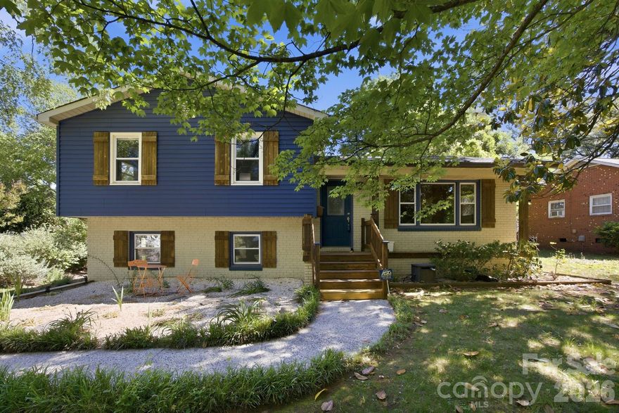 Mid-century bones, serious infrastructure, and a property designed for cooks, hosts, green thumbs and creators. 

The main residence is a four-bedroom, two-bath tri-level with two generous living areas and natural light contrasting rich hardwoods. The kitchen has been fully rebuilt, quartz counters, new cabinetry, new bosch induction cooktop, convection oven and refrigerator; a  kitchen for people who love to cook and entertain. 

The climate-controlled workshop and studio with lofted storage above the garage is scaled for serious maker or creative studio operations; and wired for what comes next. ADU potential subject to buyer verification of zoning and permitting.

Outside is an intentionally designed garden filled with color, with flagstone paths through japanese maples, corten steel planters, a curated perennial garden in bloom February through November, fruiting peach and pear trees, deck, fire pit, hot tub. 

A relaxing oasis with remarkable features so close to NoDa, Plaza Midwood, and Uptown. Substantial capital improvements completed; full list in agent remarks.