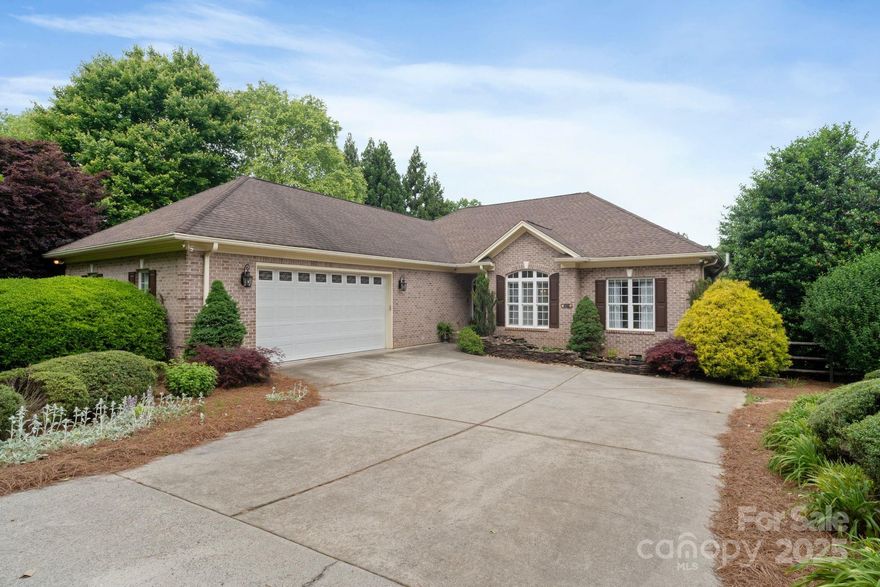 Lakefront living at its finest! This 3BR/3BA ranch with a finished walkout basement offers 3,781 sq ft of versatile space, including a bed/bonus room that allows this to live like a 4BR home. The main level features a cozy living room with fireplace, flowing seamlessly into the kitchen with an island with prep sink, stainless steel appliances, and breakfast area—all overlooking Lake Norman. Primary suite provides privacy and direct access to your own private deck and hot tub.  2 bedrooms and laundry room round out the main level. Basement includes the bonus/bed room, full bath, game room, playroom, and a fully equipped wet bar area. Outside, enjoy the covered back patio overlooking spacious yard including fire pit, outdoor shower, play area, room for a pool, and private dock w/year round water access. The oversized 2-car garage offers an electric car charger, and storage area. No HOA! Don't miss this incredible opportunity to own a waterfront retreat on Lake Norman.