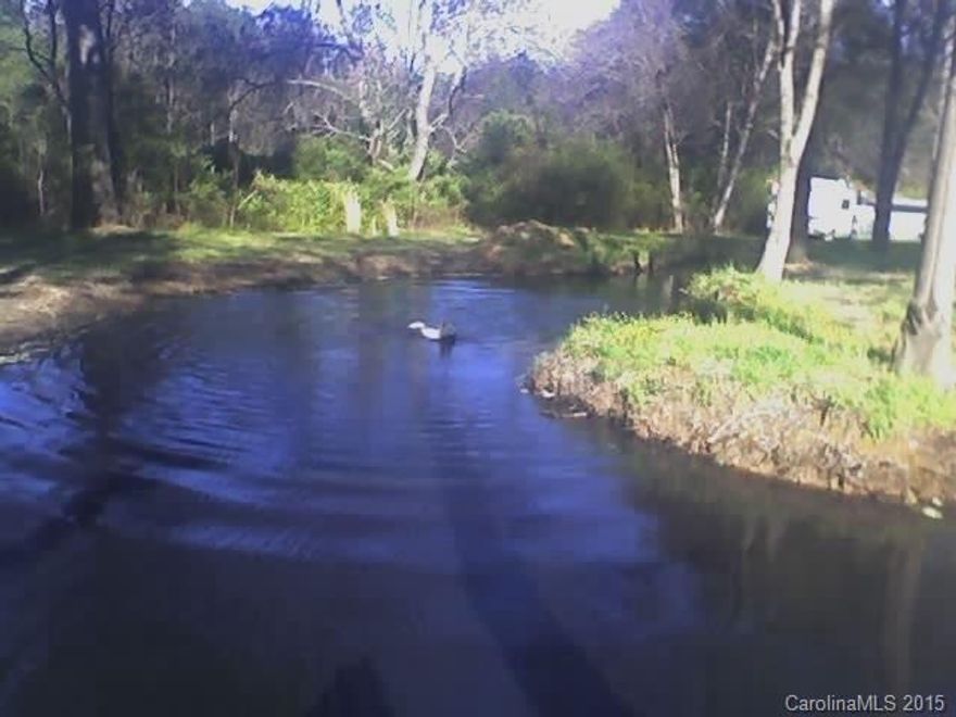 Private 9 1/2 Acres on a hill with pond. Needs work. Bring all offers.