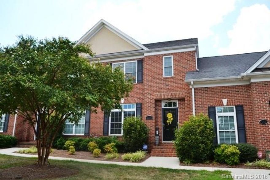 What a doll house! Awesome community convenient to I-77, shopping and restaurants!  This townhome offers great room with fireplace/gas logs, dining area and a granite kitchen!  Hardwood floors throughout main level.  Beautiful tile flooring in both baths.  Master bath as double vanity and large shower.  Second bedroom also has a private bath.  You will love the courtyard just off the double garage.  A must see!