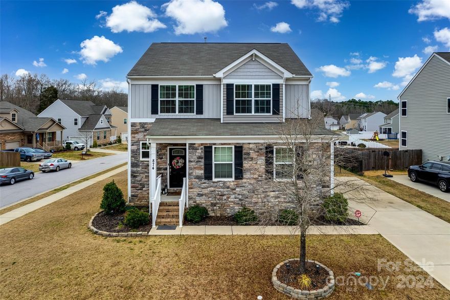 Beautiful home that shows like a model.  Large open floor plan on the main level with an amazing kitchen and huge breakfast bar.  Refrigerator remains.  Upstairs you will find 3 bedrooms plus a nice bonus area.  Laundry is conveniently located upstairs.  Be prepared to fall in love outside with the fenced in corner lot.  Pergola and play set.  Attached 2 car garage.