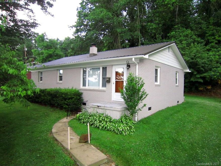 Beautiful Remodeled Brick Home!  2 Bedrooms, 1 Bath, 1093 SqFt, Wonderful Large Living Room With Hardwood Floors & Lots Of Light, Large Eat-In Kitchen With Granite Counter Tops & Stainless Steel Appliances & Breakfast Bar & Chair Rail Molding, Master Bedroom With Hardwood Floors, Oil Furnace & Central Air, Tile Front Porch, New Metal Roof, Very Close To Downtown & Located Close To Resturants & Shopping