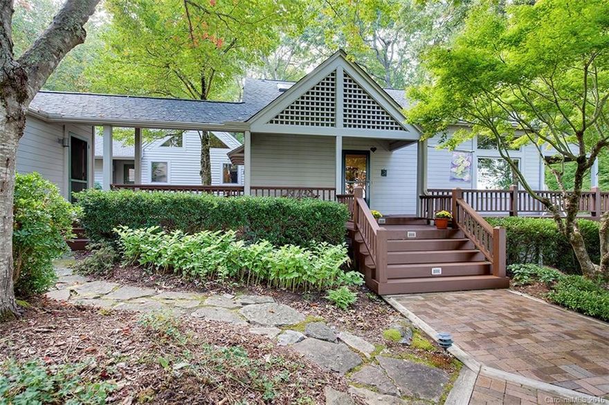 Remarkable VIEWS of the Blue Ridge Parkway & Shining Rock from this Outstanding Unique Custom home. Every room is surrounded w/windows bringing nature in on a private 5 plus acre lot. Al Platt designed addition off of the master bedroom has separate entrance. Separate building includes a large workshop w/walk out basement, garden room w/sink, & 2nd living quarters above 2 car garage. The surrounding gardens include two courtyards, one w/a patio & water feature. Attention to detail throughout.