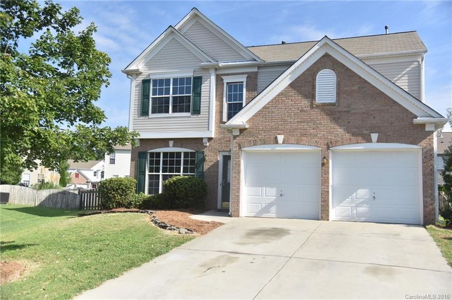 Beautiful two story home with formal dining room and open kitchen and family room with fireplace lead you through downstairs to the hidden stair case up to the four bedrooms.  All bedrooms have  laminate flooring, with carpet in the family room and stairs and hallway upstairs.carpet and tile floors.  Crown molding complements the downstairs area and is extensive in the master bedroom.  Show this lovely home and be the hero to your buyers.