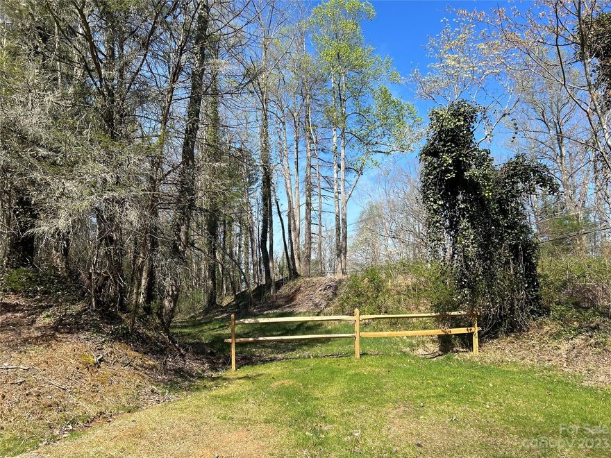 Seller is motivated! Just across from the proposed Saluda Grade Trail, this lovely 3.71 acres is just .9 miles from Historic Downtown Saluda. The SGTrail will go the miraculous 31 mile stretch from Zirconia, NC to Inman, SC and has a proposed completion of 2028... plenty of time to build your dream home! This lot resides in gated Mountain Vista, and though there are some minor restrictions on what you can build, there are no restrictions on short term rentals! The sqft minimum is only 1064 on the main level and must be 1600 in total. You already have a driveway cut into the perfect homesite. Saluda features a multitude of restaurants, shopping and art galleries. We are home to the famous Coon Dog Day Festival, and the Saluda Arts Festival. The time is now to build that second home on this gentle lying lot. Or, purchase as an investment and resell it after the Saluda Grade Trail is complete. Priced 20k under tax value. Hendersonville city water. High speed fiber optic coming soon!