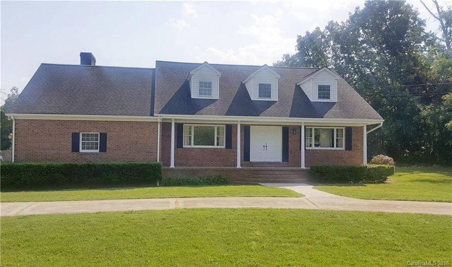 Wonderful home with lots of features, Flat lot with large front porch and over-sized rear deck.  Home has tons of built in cabinetry, 2 living areas, very large laundry room, roof only a few years old, new hot water heater. You wont find a better deal in the area anywhere.  propane fireplace in living room and kitchen is open to this room. 1 year home warranty included with acceptable offer