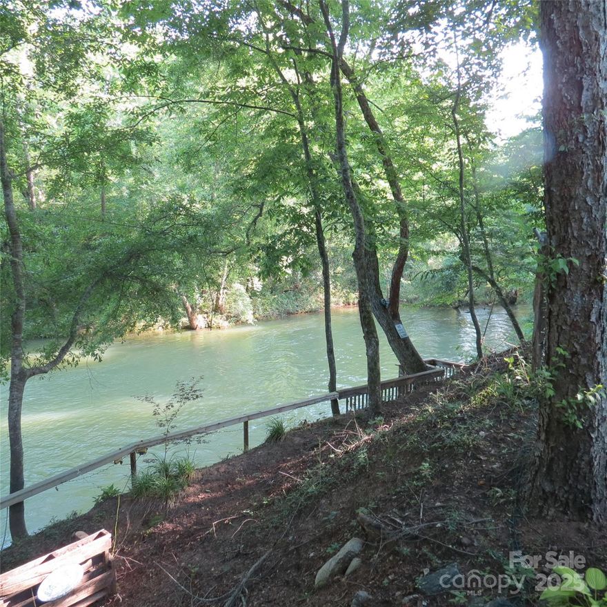 Enter the gates into the private log cabin community of Hidden Lake. The fishing/ paddling lake has it's own floating dock and boardwalk. The lake side park includes an in ground pool with a jetted tub and showers with a changing room and facilities. There is a creekside park on Shoal Creek with grills and picnic area. The hiking trails , paved roads and fabulous mountain views throughout the community make Hidden Lake a truly special mountain retreat. 
 This 2.5 +/- property is located on Shoal Creek. There are gorgeous mountain views to compliment the rushing sounds of the creek. This property is secluded and private yet only minutes to I-40. Asheville, Marion, Black Mountain, Lake James and Old Fort are minutes away. There are two hospitals, schools and restaurants close by. Schedule your showing today.
