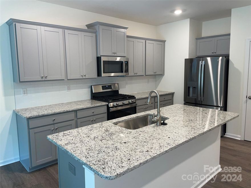 Beautiful and spacious 3 bedroom, 2.5 bathroom townhome with a one car garage. This townhome is brand new and comes with vinyl plank flooring, granite kitchen countertops, stainless steel kitchen appliances, timeless shaker style cabinetry, quartz bathroom countertops, and much more. Open floor plan with large kitchen island available for extra seating, small appliance storage, and bonus food prep space. Upstairs includes two bedrooms, full bathroom, laundry room and primary bedroom/bathroom. Conveniently located in Monroe, NC, close to shopping centers, restaurants, and entertainment options. Four Seasons residents are enrolled in a Resident Benefits Package 
 (RBP) for $50/month. See flyer for details. *Security deposits could be as high as twice the monthly rent depending on the quality of the application and the requested lease terms. **Move in date will be determined once the application is approved and the security deposit is paid.