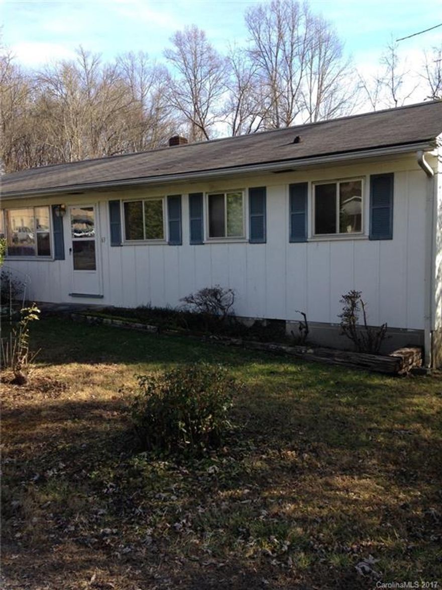 One level home with carport and large backyard. A convenient walk or bike to downtown.