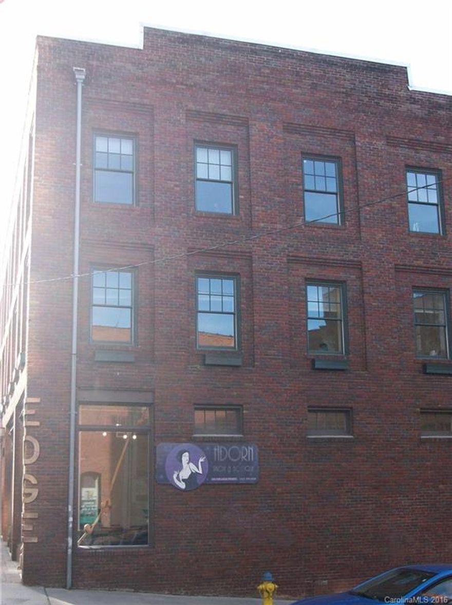 Price Reduced! Full Service Office Space in Downtown Asheville with VIEWS! Unit 301 offers a large entry reception/work room and two private offices. Located next to City Parking Decks, common area bathrooms x 3 on each floor, beautiful secure entry with rotating display window for tenants use. Great walking area with huge traffic count and visibility. Completely updated and renovated historic building. Call listing agent to view!