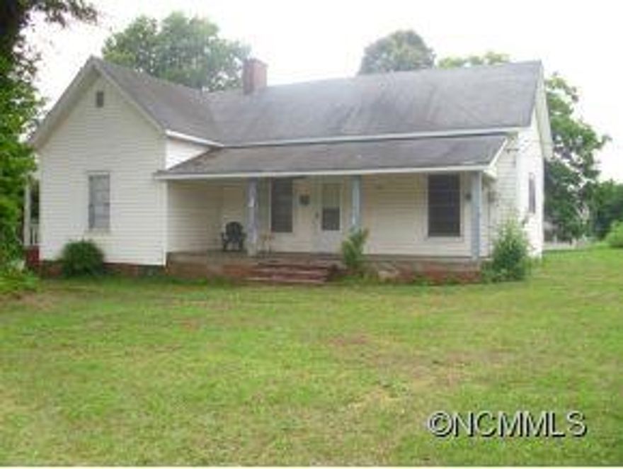 OLDER HOME WITH LARGE YARD ON CORNER LOT. ALL APPLIANCES STAY INCLUDING WASHER AND DRYER. FRONT PORCH AND BACK PORCH THAT HAS BEEN CLOSED IN FOR STORAGE.