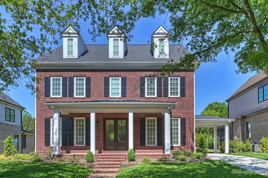 Custom-built, Alan Simonini home in the new phase of Heydon Hall. Attention to detail & luxury finishes throughout! Heydon Hall is one of South Charlotte's premier gated communities situated next to Quail Hollow Golf Course. This 3-story home w/10' ceilings on the main, open floor plan & HW floors throughout 1st & 2nd levels. Kitchen is equipped w/high-end appliances, marble counters, custom cabinetry & expansive island.  Lg sliders lead onto covered patio w/gas FP. All bedrooms are situated on 2nd floor. Primary suite w/separate free-standing tub, spacious shower & custom closet systems. The 24x22 3rd-level bonus room offers tons of flexibility. Home also offers a 2-car detached garage equipped w/a charging station & Porte-Cochere. HOA dues incl. landscaping of front yard & common areas, irrigation of the property, fountains & gas lamps.  SELLER TO PROVIDE OVER $6,500.00 CONCESSION AFTER CLOSING FOR LANDSCAPE SCREENING.  SEE ATTACHMENTS FOR PROPOSAL BY LANDSCAPE DESIGNER, MYRON GREER!