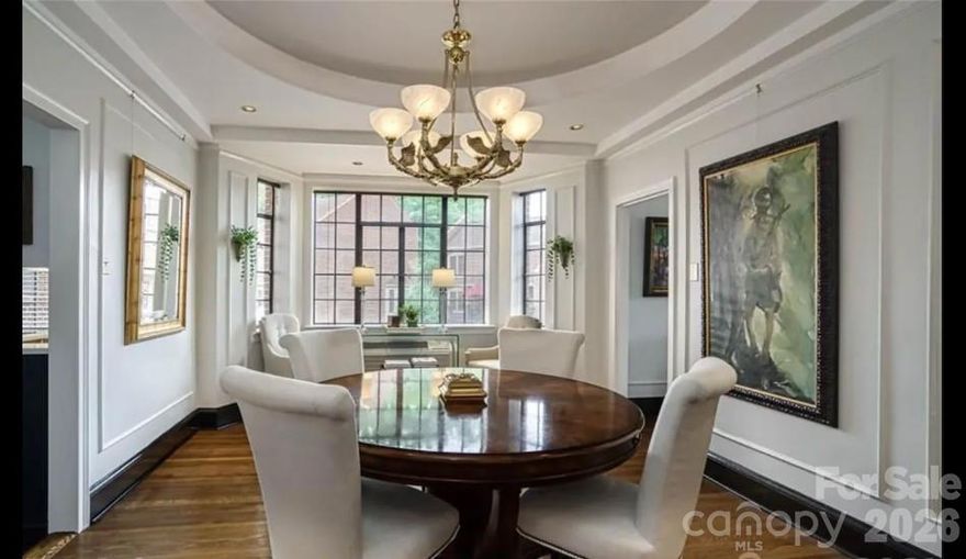 Light filled second floor unit in one of Charlotte's most unique buildings located in the heart of Fourth Ward. Built in 1929 The Poplar is representative of prewar construction found in other great cities.  The concrete and steel post and beam construction allows for flexible interior configurations since most walls are not load bearing.  The majority of units have been modified to match each owners unique tastes, not cookie cutter floor-plans!

A former owner had special clothing needs and converted the second bedroom into an over-sized closet and dressing area.  Current owners kept this arrangement but are open to removing the closet walls if buyers prefer.

Fireplaces in the building work but sellers make no representation. Recommend buyers engage a chimney sweep after closing and before using. Instant hot water is supplied by gas boilers in the basement and is included in the HOA fee.Each unit has a storage unit in the basement.  One parking spot, (unassigned), in the gated parking lot.  Basement parking in lieu of the outside lot, when available, is $75 monthly.  Permitted Fourth Ward on street parking is available through ParkIt for a nominal annual fee. Common laundry facilities are in the basement.