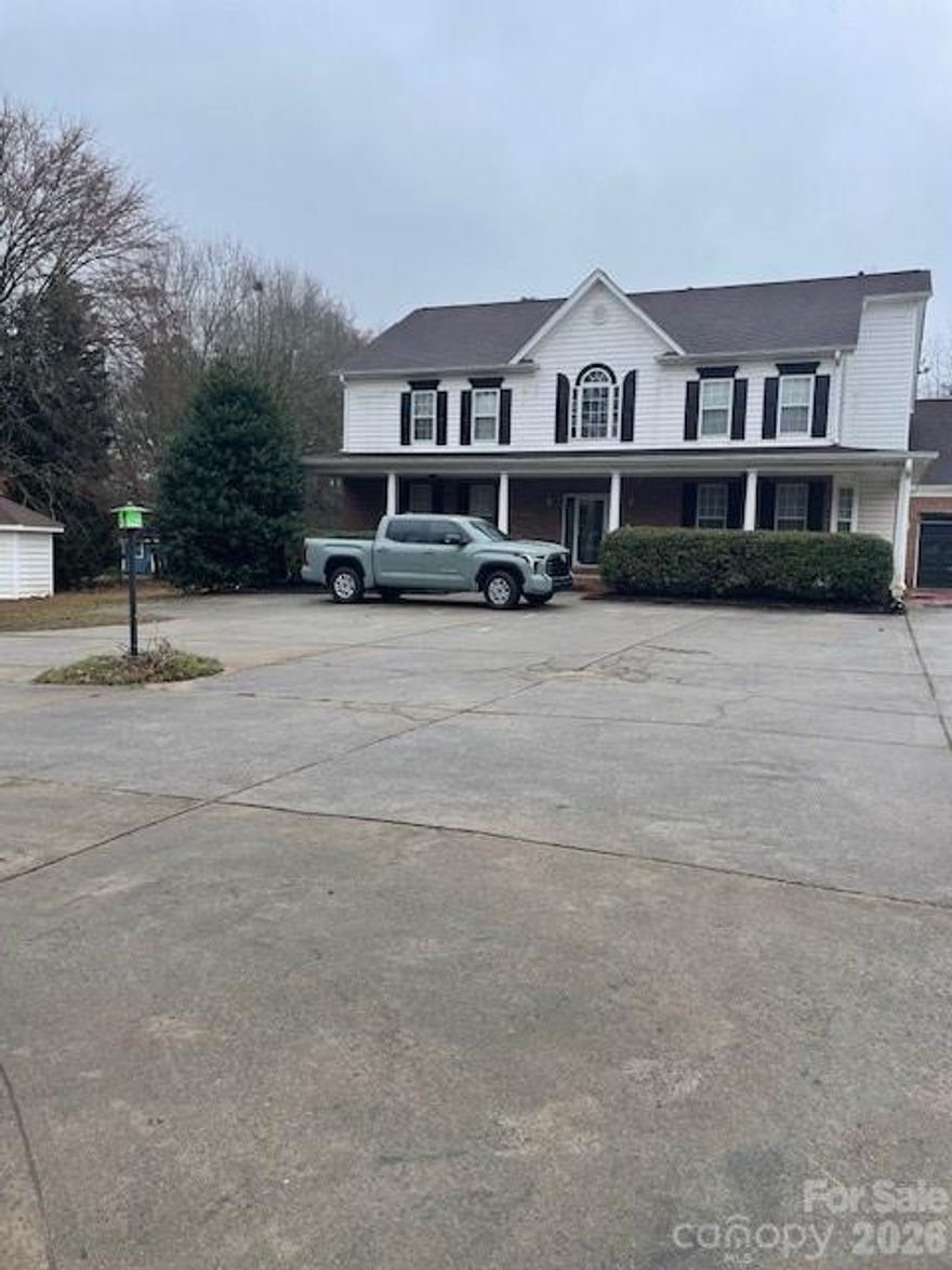 Look no further for a home close in and no HOA with acreage.  Stairs in Garage lead to upstairs room making over 5,000 sq. ft. heated and cooled.   Large lot -  1.71 acres w/ability to park your RV, boats, trailers on a great level lot.  Greatroom and recreational/sunroom room on main.  2 Primary bedrooms.   The oversized garage is spacious enough for more than 2 cars. Detached building for 2 more cars.   2 laundry rooms - main and 2nd level.  The wonderful new deck is spacious and great for entertaining.  Playhouse stays with property.   Water heater installed in 2021,  new roof in 2015, new HVAC in 2016, crawl space encapsulated.    Large front porch and deck for entertaining.  Just minutes away from highly ranked Fort Mill School District and close to Ballantyne, Indian Land shopping and dining.
