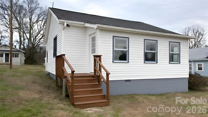 Welcome to this beautifully reimagined residence in the heart of Bessemer City. This home has been modernized with high-end finishes, offering a perfect blend of style and efficiency. The standout feature is the versatile sunroom/reading room at the front of the property, anchored by a custom accent wall that creates a stunning first impression and the perfect space for a home office or relaxation.
Experience total peace of mind with a full mechanical and aesthetic overhaul, including high-efficiency mini-split HVAC units for zoned climate control and a brand-new gravel driveway. The interior shines with a bright, open-concept layout featuring fresh neutral paint, all-new flooring, and a contemporary lighting package throughout. The chef-inspired kitchen is a complete standout, boasting brand-new cabinetry, warm butcher block countertops, and a full suite of brand-new stainless steel appliances. The bathroom has been fully transformed with a brand-new shower/tub combo, a modern vanity, and upgraded fixtures.
Every detail has been addressed, from the new interior and exterior doors to the updated hardware throughout. Situated within walking distance to local Bessemer City amenities and just a short drive to Gastonia and the FUSE District, this turn-key transformation is a must-see. Schedule your tour today!